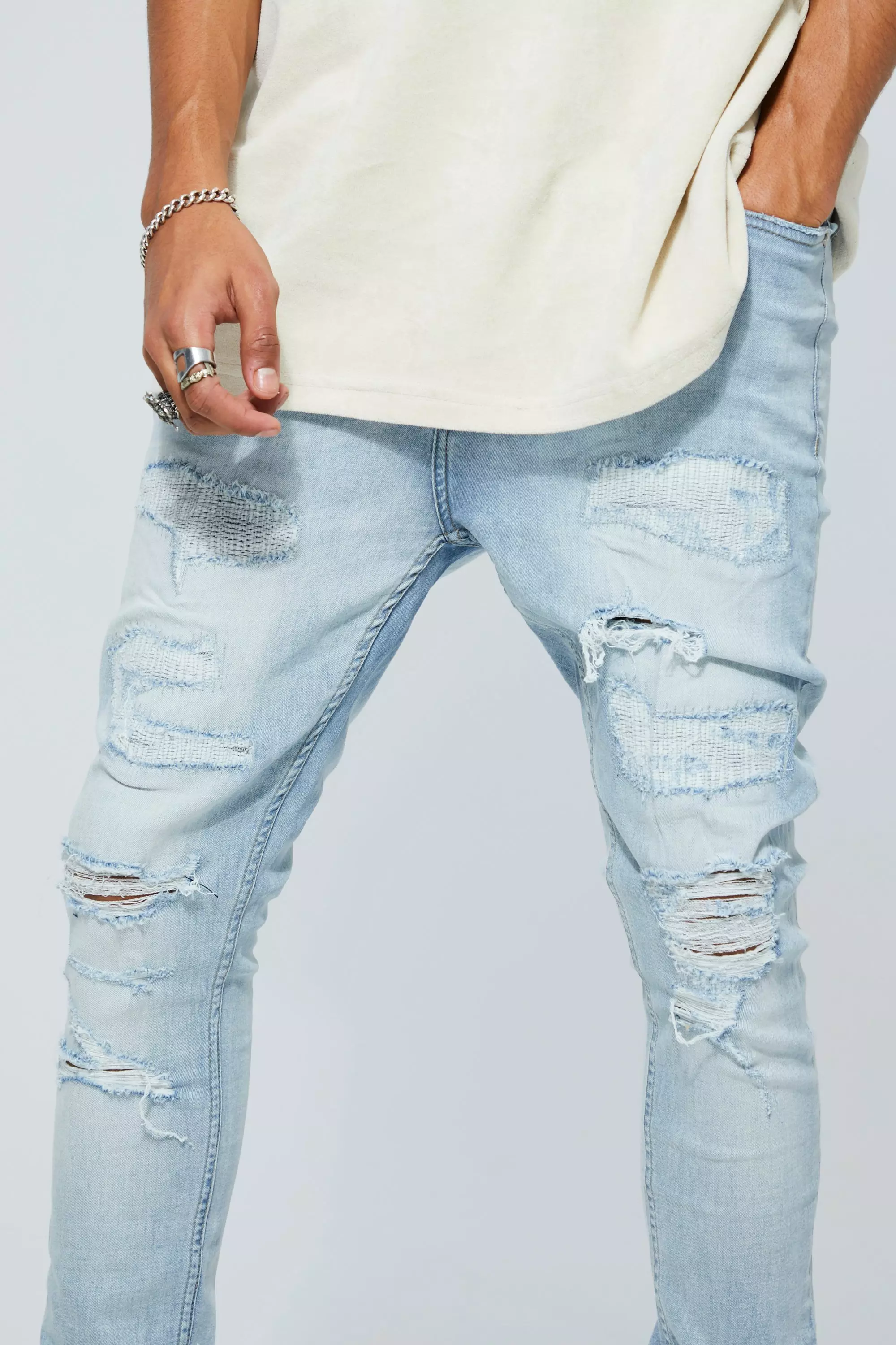 Distressed light wash jeans hot sale mens